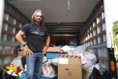 Shirt Off My Back (Pic Of Tom with Logo Shirt in box truck